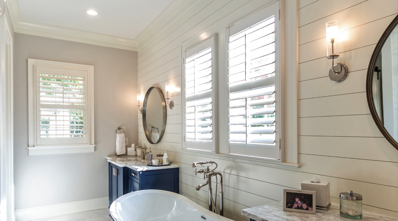 Orlando bathroom with white plantation shutters.