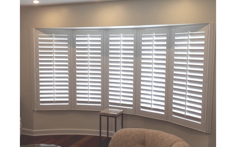 Bay Window Shutters In Orlando Sunburst Fl Shutters On A Bow Window