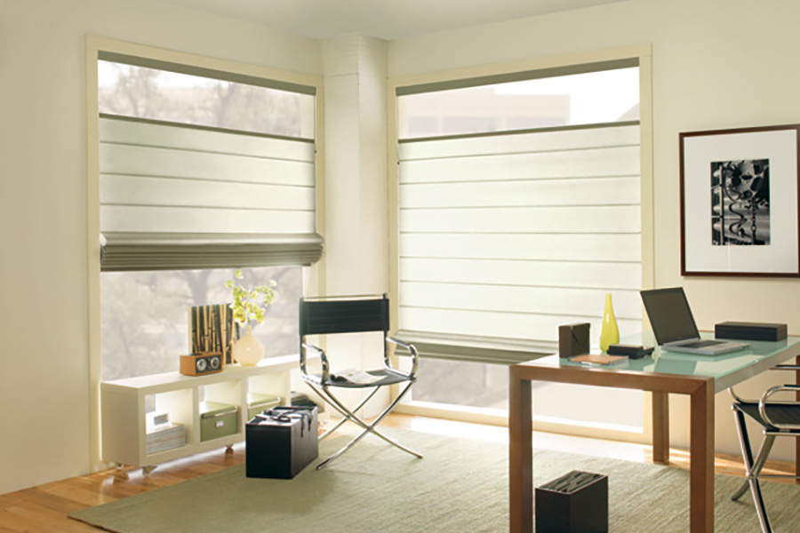 White top-down/bottom-up Roman shades in a home office.
