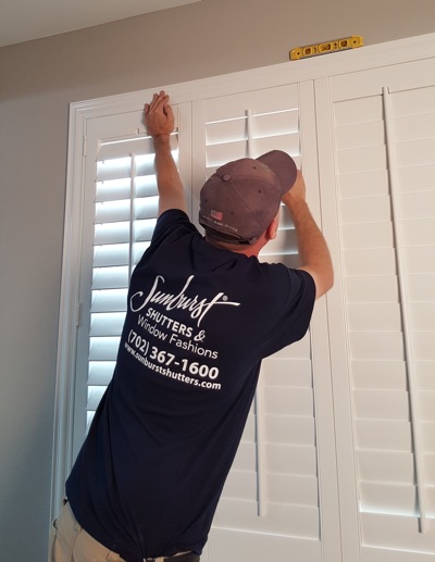 Shutter installation in Orlando bedroom.