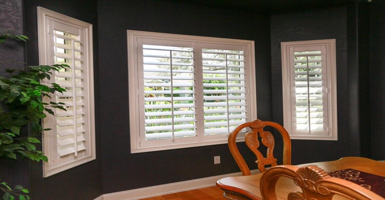 White Polywood Plantation Shutters In Dining Room With Dark Paint