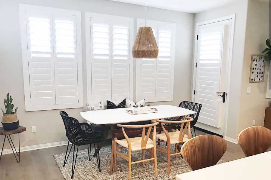 Use Polywood shutters to control natural light levels in your Orlando dining room. Polywood shutters with top louvers tilted open in a dining room