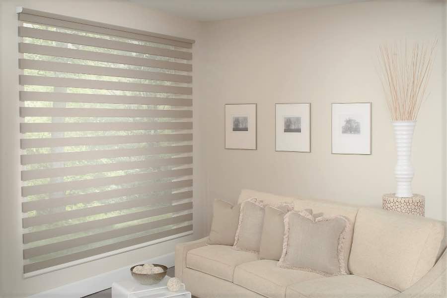 Zebra shades give you a unique combination of light control and style that benefits your Orlando home. Zebra shade allows filtered light into a living room