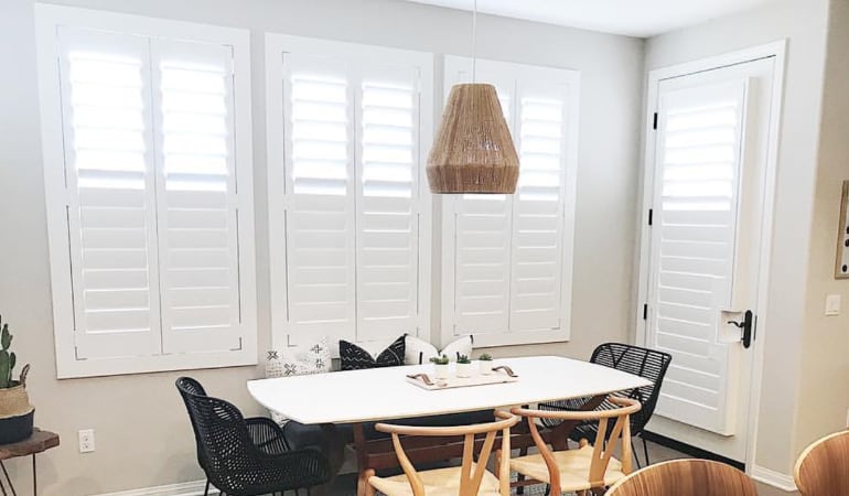 Photo Credit: Audrey Crisp Interiors Plantation shutters in a dining room