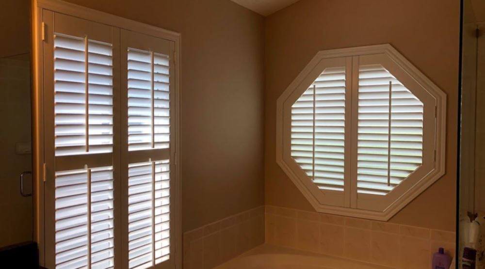 Octagon window treatments Octagon window in a Orlando bathroom