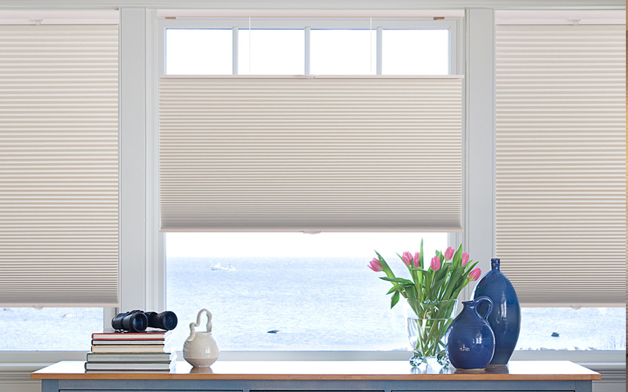 Energy efficiency with a modern twist in Orlando. Cellular shades in oceanside beach house.